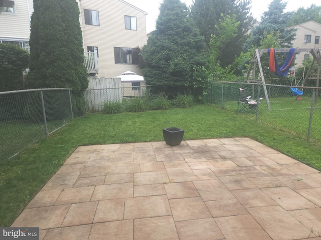 1512 Marcy Pl Unit B, Philadelphia, PA 19115 - fenced backyard with a patio