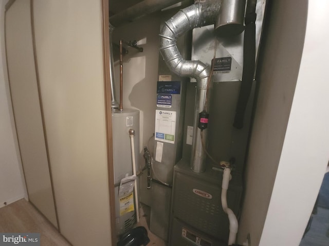 1512 Marcy Pl Unit B, Philadelphia, PA 19115 - utility room featuring water heater and heating unit