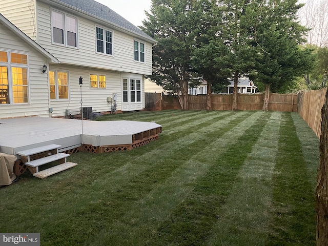 214 Primavera Cir, Sterling, VA 20165 - view of yard featuring a fenced backyard and a deck