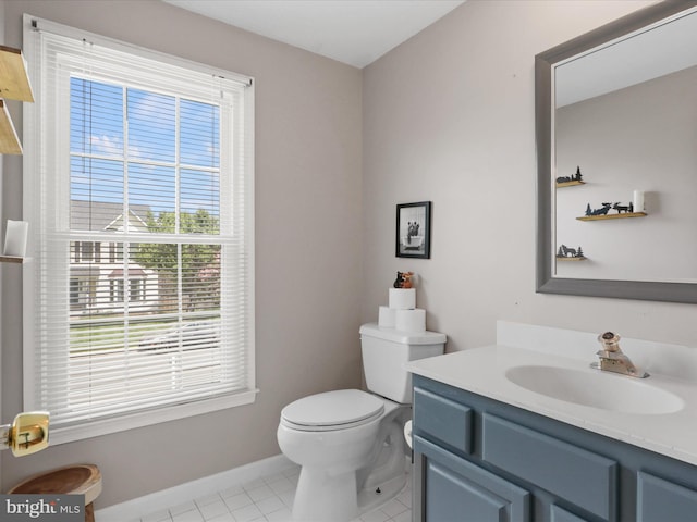 214 Primavera Cir, Sterling, VA 20165 - half bath with toilet, tile patterned floors, baseboards, and vanity