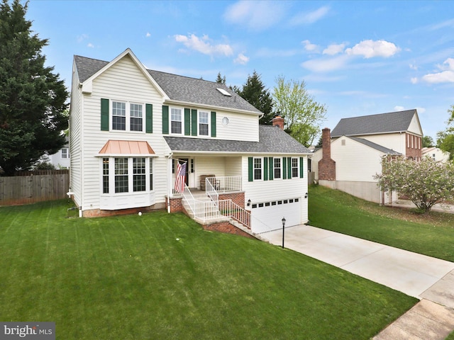 214 Primavera Cir, Sterling, VA 20165 - traditional home featuring roof with shingles, a front yard, and concrete driveway