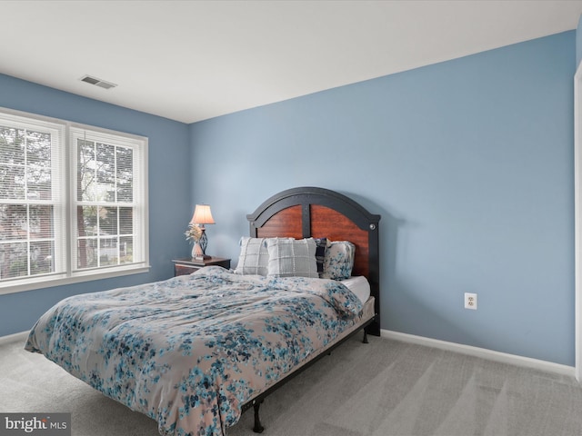 214 Primavera Cir, Sterling, VA 20165 - bedroom with visible vents, carpet, and baseboards