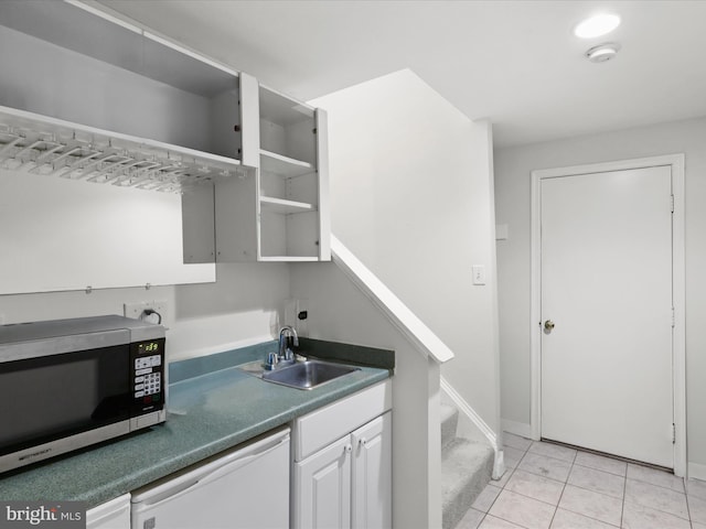 214 Primavera Cir, Sterling, VA 20165 - washroom with a sink, light tile patterned floors, and baseboards