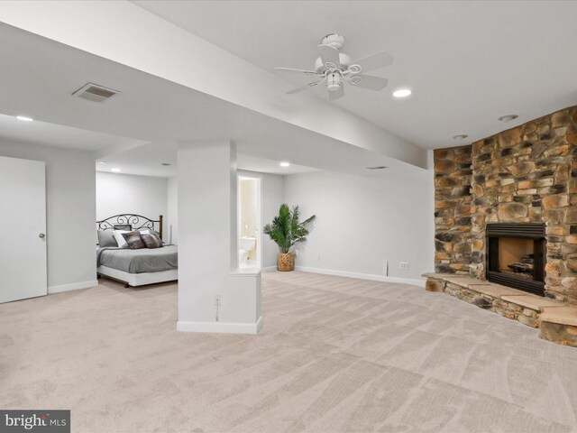 214 Primavera Cir, Sterling, VA 20165 - finished basement with visible vents, baseboards, carpet floors, and a fireplace