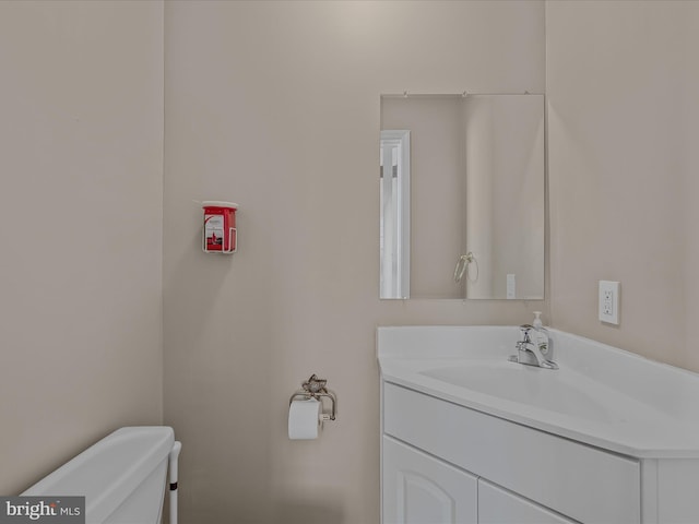 203 S George St, Charles Town, WV 25414 - half bathroom featuring toilet and vanity