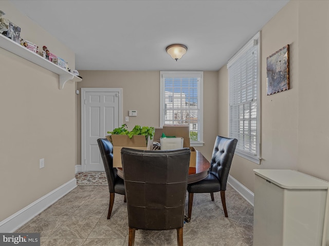 203 S George St, Charles Town, WV 25414 - dining room featuring baseboards