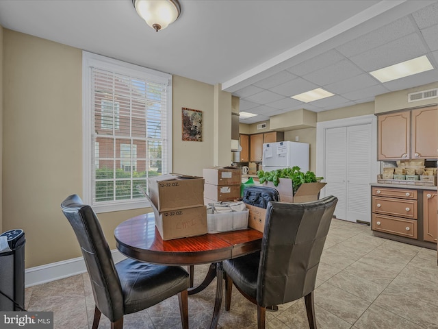 203 S George St, Charles Town, WV 25414 - dining room with baseboards, visible vents, and light tile patterned floors