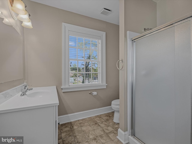 203 S George St, Charles Town, WV 25414 - full bath featuring a shower stall, visible vents, baseboards, toilet, and vanity