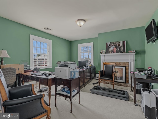 203 S George St, Charles Town, WV 25414 - office with a fireplace, a wealth of natural light, visible vents, and carpet floors