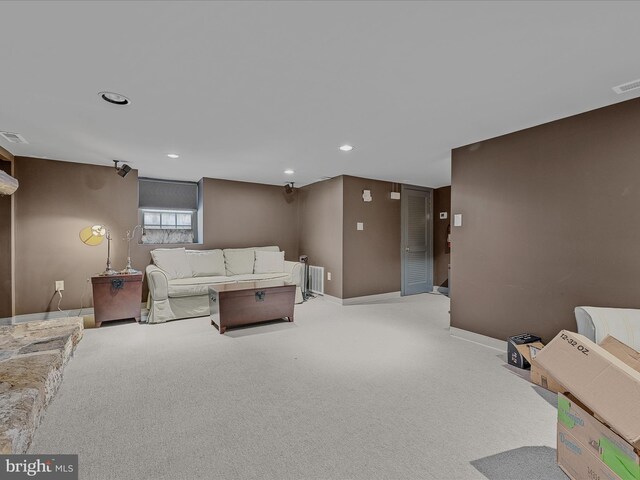 203 S George St, Charles Town, WV 25414 - living room with recessed lighting, light carpet, and baseboards