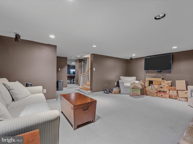 203 S George St, Charles Town, WV 25414 - living room featuring visible vents, recessed lighting, stairs, and light carpet