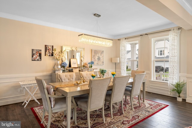 35898 Quantum Pl, Round Hill, VA 20141 - dining space with hardwood / wood-style flooring, a chandelier, crown molding, a wainscoted wall, and a decorative wall