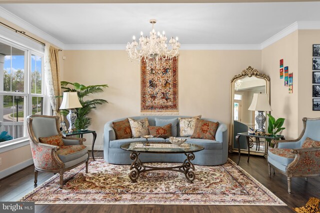 35898 Quantum Pl, Round Hill, VA 20141 - living area with wood finished floors, crown molding, a chandelier, and baseboards