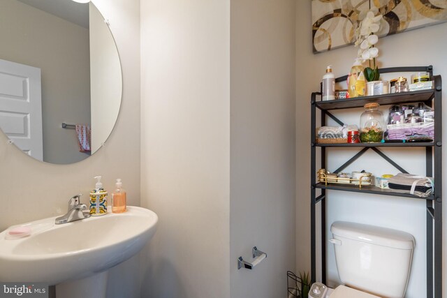 35898 Quantum Pl, Round Hill, VA 20141 - half bathroom with a sink and toilet