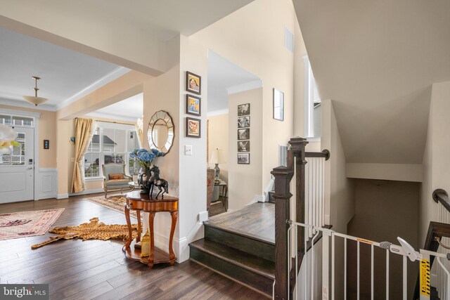 35898 Quantum Pl, Round Hill, VA 20141 - stairs featuring wood finished floors and crown molding