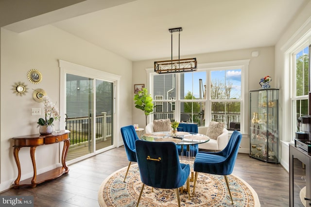 35898 Quantum Pl, Round Hill, VA 20141 - dining space featuring wood finished floors, baseboards, and a chandelier