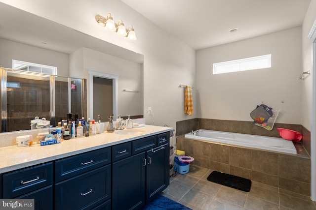 35898 Quantum Pl, Round Hill, VA 20141 - bathroom with tile patterned floors, a shower stall, vanity, and a garden tub