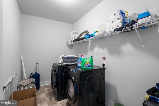 35898 Quantum Pl, Round Hill, VA 20141 - washroom featuring washer and clothes dryer and baseboards