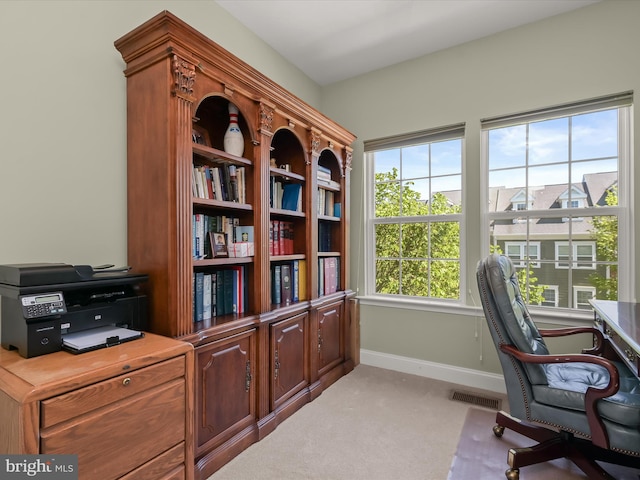 office space featuring visible vents, carpet, and baseboards