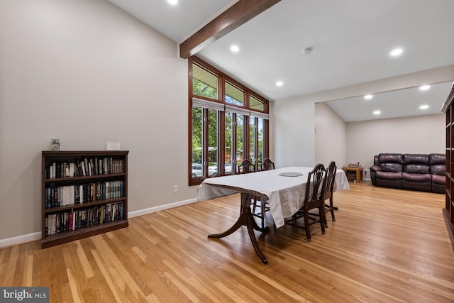 dining area featuring beamed ceiling, light wood-type flooring, baseboards, high vaulted ceiling, and recessed lighting