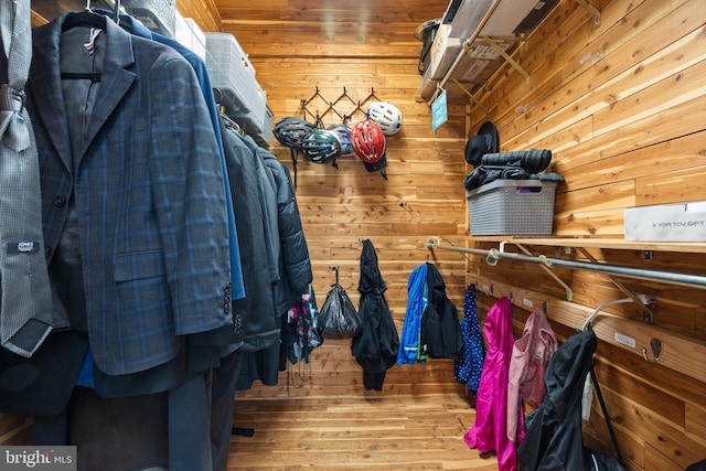 spacious closet featuring wood finished floors