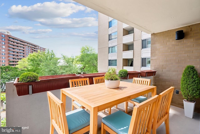 balcony with outdoor dining space