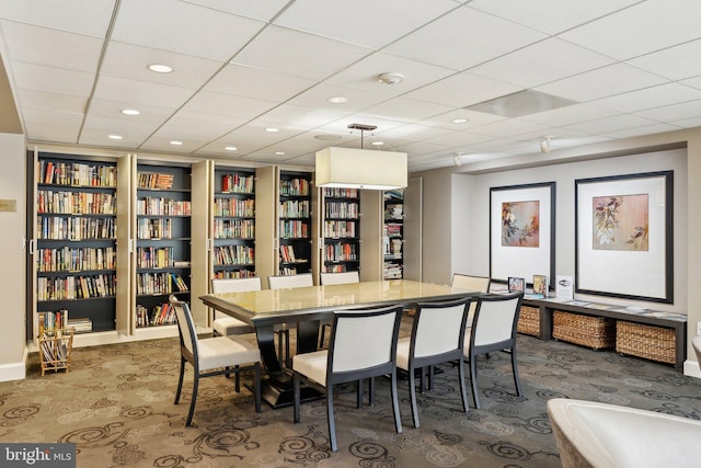 dining area with carpet flooring, built in features, recessed lighting, and baseboards