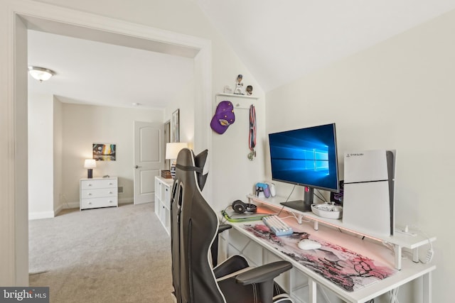 carpeted office space with baseboards