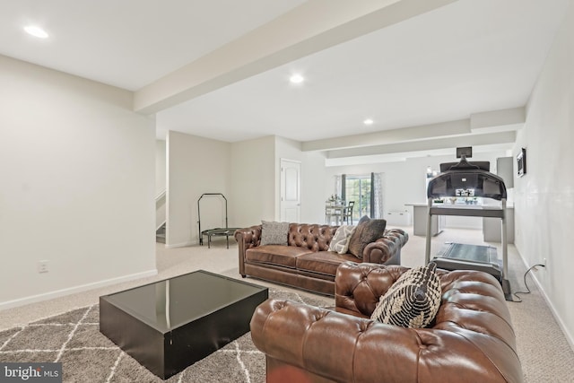 carpeted living room featuring recessed lighting and baseboards