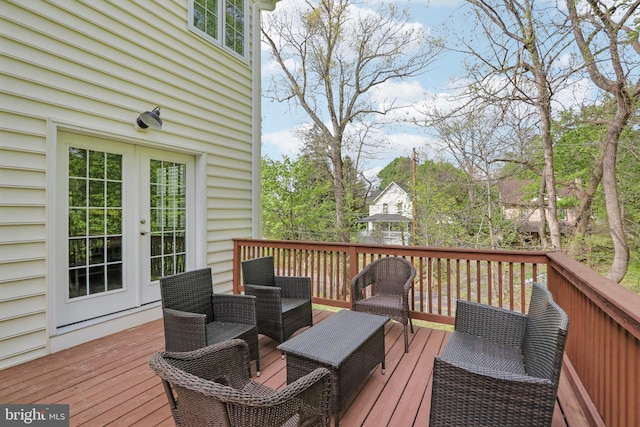 wooden deck featuring french doors