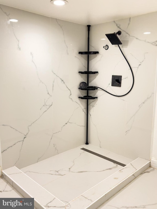 details with a marble finish shower