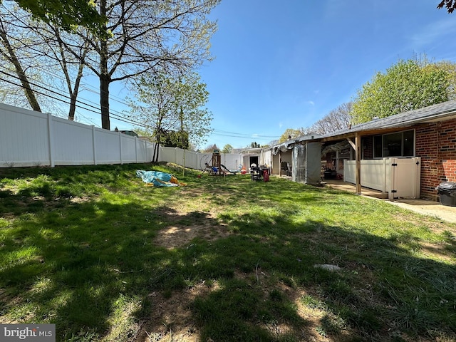 view of yard with fence