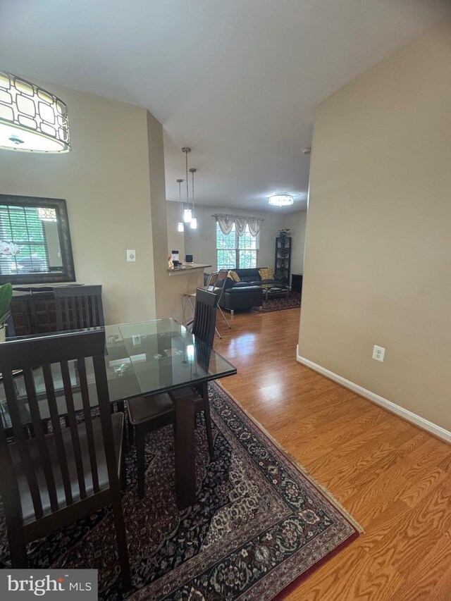 8800 Fenimore Pl, Bristow, VA 20136 - dining area featuring wood finished floors and baseboards