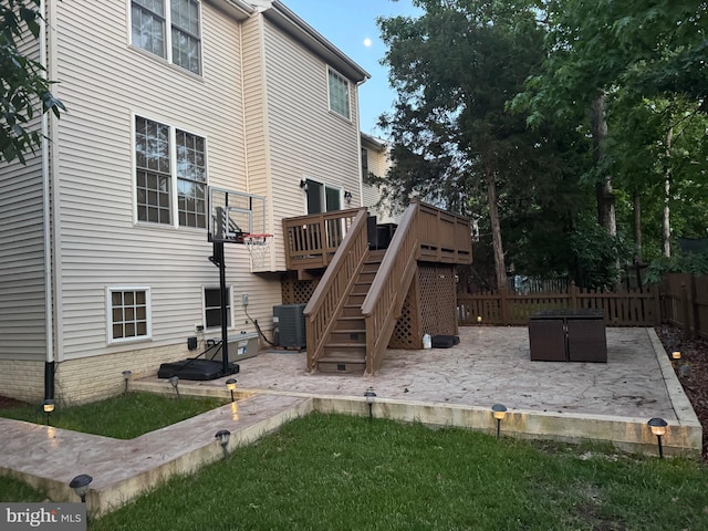 8800 Fenimore Pl, Bristow, VA 20136 - rear view of house with a patio, central air condition unit, a deck, and fence