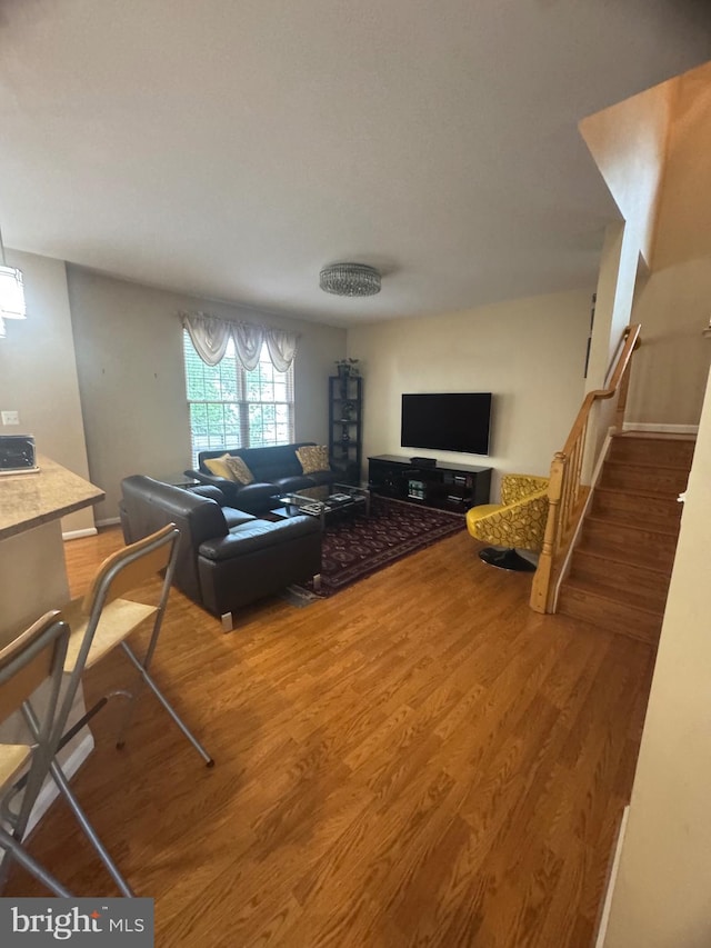 8800 Fenimore Pl, Bristow, VA 20136 - living area with wood finished floors and stairs