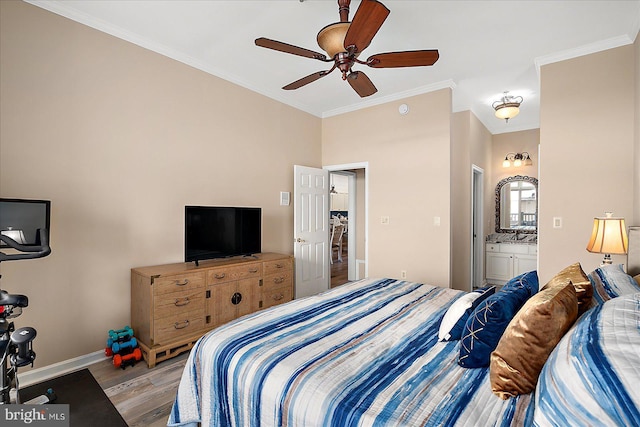 201 S Heron Dr Unit 9B, Ocean City, MD 21842 - bedroom featuring connected bathroom, ceiling fan, baseboards, wood finished floors, and ornamental molding