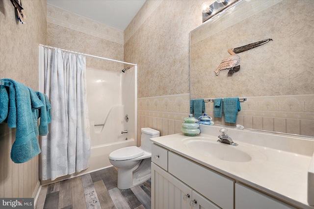 201 S Heron Dr Unit 9B, Ocean City, MD 21842 - bathroom featuring toilet, wood finished floors, shower / bath combo, and vanity