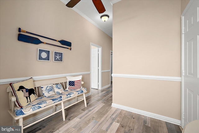 201 S Heron Dr Unit 9B, Ocean City, MD 21842 - living area featuring crown molding, ceiling fan, baseboards, and wood finished floors
