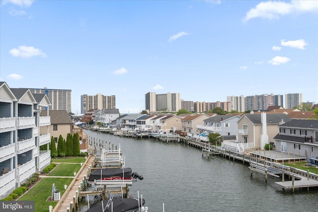 201 S Heron Dr Unit 9B, Ocean City, MD 21842 - water view featuring boat lift, a residential view, and a dock