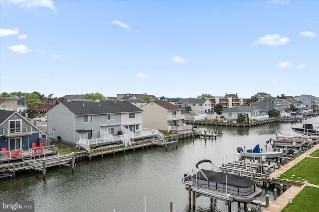 201 S Heron Dr Unit 9B, Ocean City, MD 21842 - view of dock featuring a residential view, boat lift, and a water view