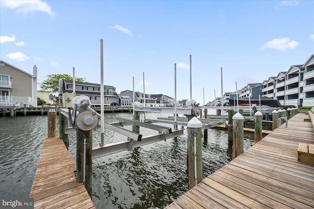 201 S Heron Dr Unit 9B, Ocean City, MD 21842 - dock area featuring a water view and boat lift