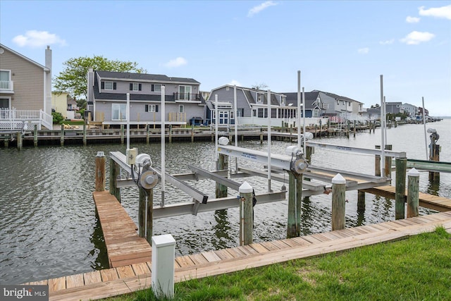 201 S Heron Dr Unit 9B, Ocean City, MD 21842 - view of dock with a water view, boat lift, and a residential view
