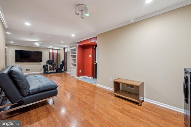living room with recessed lighting and baseboards