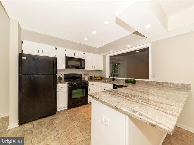 20216 Tidewinds Way, Germantown, MD 20874 - kitchen with black appliances, a peninsula, a sink, white cabinets, and recessed lighting
