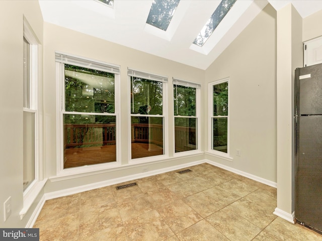 20216 Tidewinds Way, Germantown, MD 20874 - unfurnished sunroom featuring vaulted ceiling and a skylight