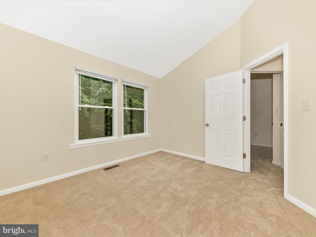 20216 Tidewinds Way, Germantown, MD 20874 - unfurnished room featuring light carpet, baseboards, and vaulted ceiling