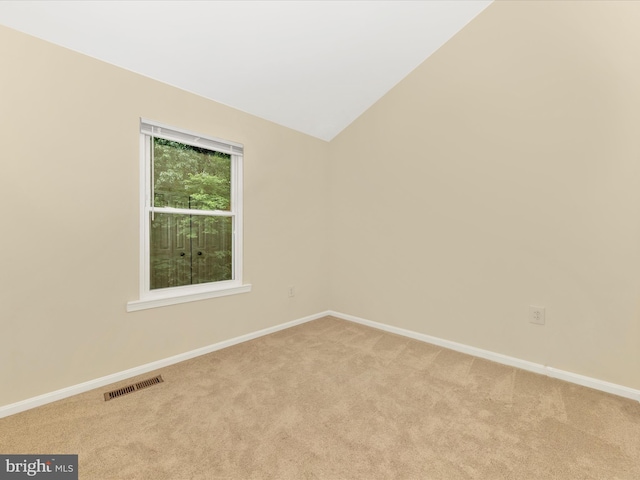 20216 Tidewinds Way, Germantown, MD 20874 - empty room featuring light carpet, baseboards, and lofted ceiling