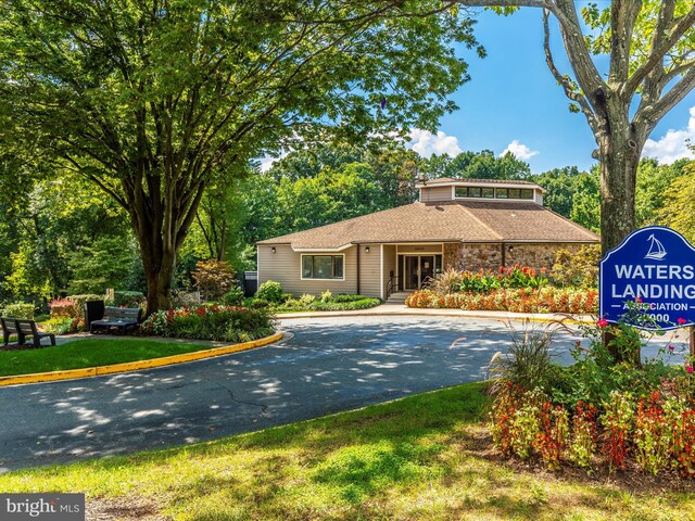 20216 Tidewinds Way, Germantown, MD 20874 - view of front of property featuring roof with shingles and stone siding