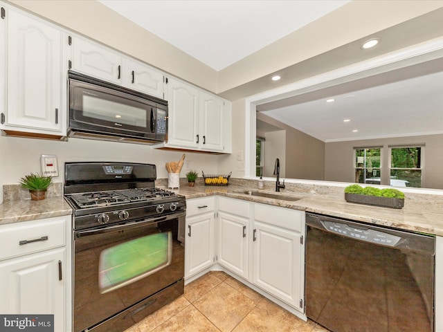 20216 Tidewinds Way, Germantown, MD 20874 - kitchen featuring black appliances, a sink, light stone counters, recessed lighting, and white cabinetry