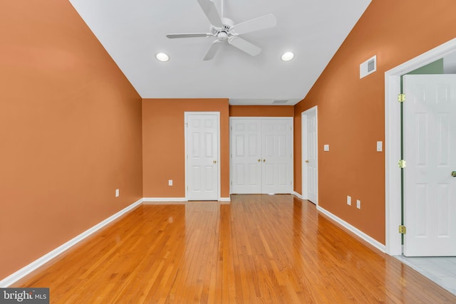 unfurnished bedroom with recessed lighting, baseboards, visible vents, and light wood finished floors
